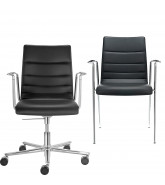 Fina Armchairs upholstered in Leather.
