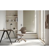 Ray Work Chair with upholstered seat and back at a desk