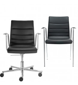 Fina Armchairs upholstered in Leather.