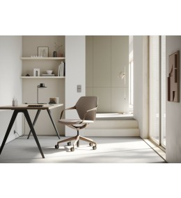 Ray Work Chair with upholstered seat and back at a desk
