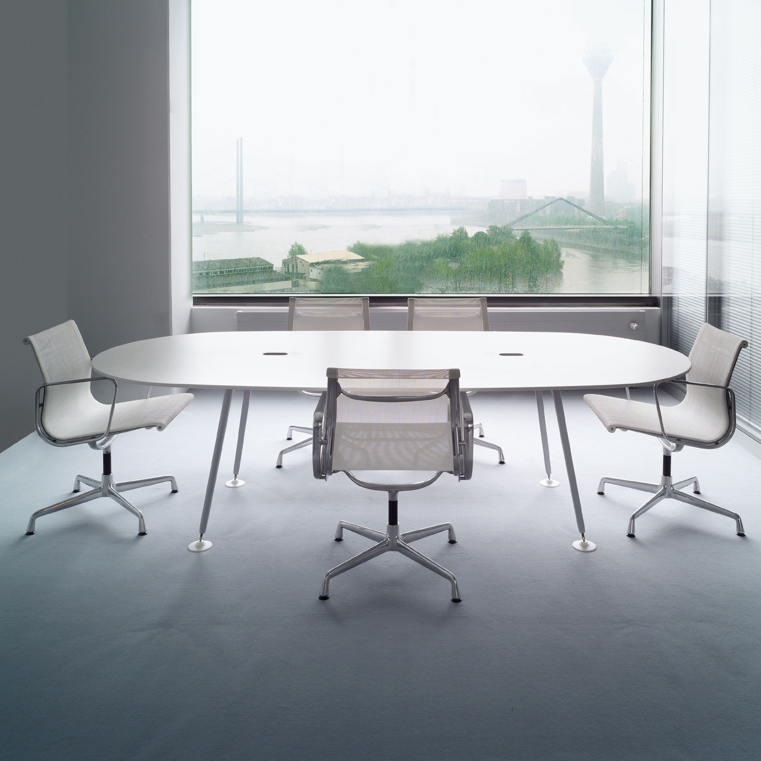 Eames Aluminium Chairs in a meeting room
